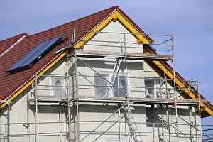Single Family Home Construction Prints: New building with completed basic rendering of the exterior facade New building with completed basic rendering of
