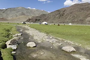 Prints of Nomadic yurts next to a river in the steppe, Aimak Bayan Ulgi, Altai, Mongolia, Asia Related Prints: Nomadic Yurts Print: Altai Steppe, Mongolia