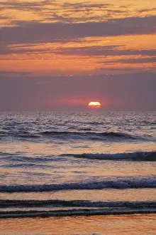 Ocean Waves on Sunset Print with Setting Sun Background