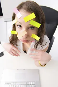 Office Worker Stress Prints: Office worker with many post-its on her face