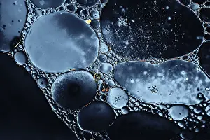 Uninhabited Waterfront Landscape Prints: Oil bubbles inside water base form patterns