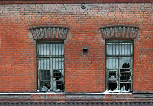 Historic City Centre Architecture Prints: Old broken window on red brick wall
