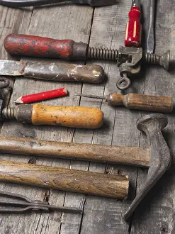 Handicraft Industry Image Prints: Old rusty tools on a used workbench