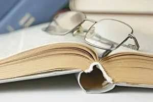 Bookstore Interior Design Prints: Open book and glasses