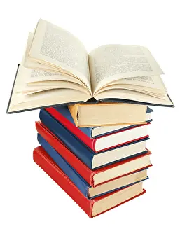 Isolated On White Prints: Open book on top of stack of books isolated on white background