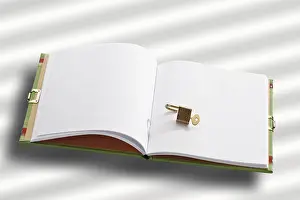 Studio Shot Of A Book Prints: Open diary with a small padlock