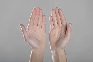 No People In Frame Prints: Open hands on gray background. Close up