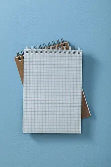 Desk Setup Ideas Prints: Two Opened Note Pads On Blue Background