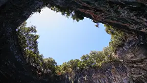 Prints of Opening in cave ceiling, blue sky, trees, Melissani cave, underground lake, Kefalonia island, Ionian Islands, Greece Lake Prints: Melissani Cave Ceiling Print, Greece