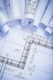 Organized Copyspace Print with Rolled Blueprints
