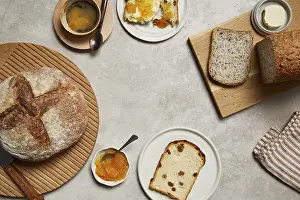 Wooden Table Breakfast Scene Prints: Overhead view of a breakfast setting featuring rustic bread