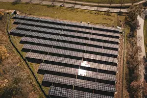 Renewable Energy Solutions Prints: Overview of solar modules in ordered formation with sunlight