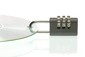 Data Theft Prevention Prints: Padlock on CD with data, symbolic for data security or password