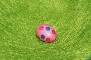 Colorful Easter Decorations Prints: Painted Easter egg on the grass
