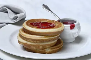 Raspberry Jam Pancake Prints: Pancake with raspberry jam and spoon