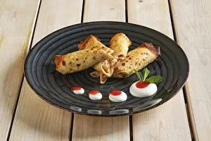 Fruit Topped Pancakes Prints: Thin pancakes with fruit stuffing
