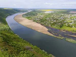 Prints of Panorama of a river with rolling hills and scattered villages in sunny weather, river Dniester or Nistru near Tipova, Rezina region, border river with the autonomous republic of Transnistria Moldova Prints: Panorama Print of Dniester River Landscape, Moldova