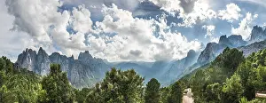 Rural European Landscape Prints: Panoramic, road through a valley with cliffs in clouds