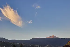 Teide National Park Landscape Prints: Panoramic view of volcano under blue sky with unique cloud formations