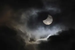 Deserted German Countryside Prints: Partial solar eclipse, thin cloud cover