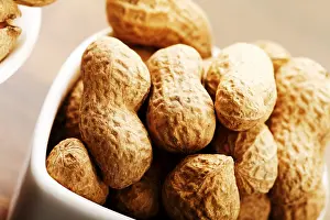 Studio Shot Of Peanuts Prints: Peanuts in white dishes