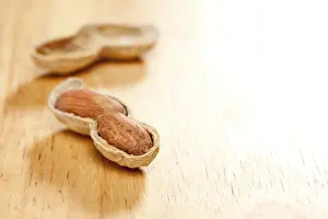 Legume Plant Photography Prints: Peanuts on wood background with dramatic lighting