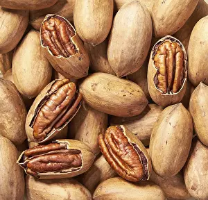 Appetizing Food Images Prints: Pecans in the background, close-up