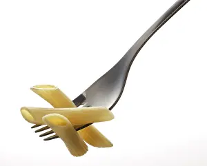 Noodle Dishes Nutrition Prints: Penne pasta on a fork