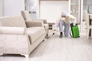 Natural Environment Pest Control Prints: Pest control contractor working in the flat