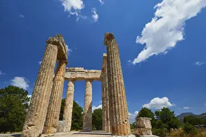European Cultural Landmarks Prints: Pillars of an ancient structure under a clear sky with few clouds