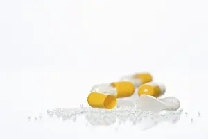 Addictive Drug Abuse Prints: Pills on a white surface