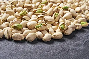Selective Focus Prints: Pistachios on black table, selective focus