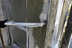 Construction Site Worker Prints: Plasterer plastering an exterior wall