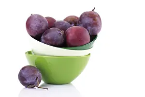 Studio Shot Plums Prints: Plums in a colourful stack of bowls