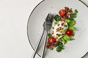 British Cuisine Images Prints: Poached egg, with bacon and vegetables