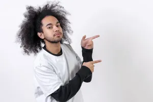 Self Confident Male Model Prints: Pointing to the right at a copy paste space