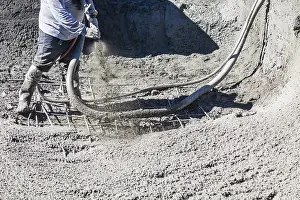 Construction Site Laborer Prints: Pool construction worker shooting concrete
