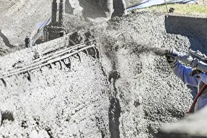 Swimming Pool Construction Site Prints: Pool construction worker shooting concrete