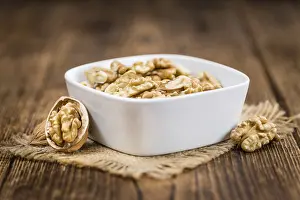Walnut Nutrition Prints: Portion of fresh Walnut kernels (close-up shot)