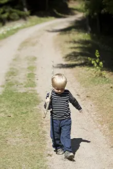 Full Body Length Portrait Photo Prints: Portrait of boy walking on path