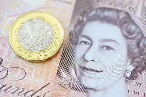Financial Market Images Prints: Pound Coin on a Ten Pound Note