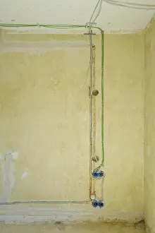 Construction Site Germany Prints: Power and network cables on a wall
