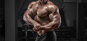 Fitness Model Male Prints: Powerful bodybuilder posing in the gym