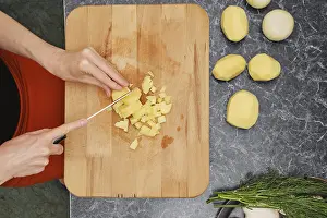 Kitchen Preparation Prints: Preparation of soup or dinner in the kitchen