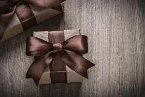 Festive Season Decoration Prints: Present boxes with brown ribbons horizontal version celebration concept