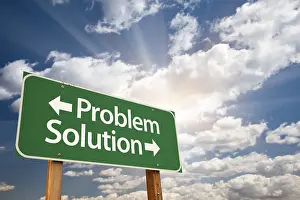 Deserted Street Sign Image Prints: Problem and solution green road sign with dramatic clouds and sky