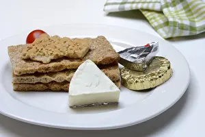 Empty Plate With Food Prints: Processed cheese on crispbread, opened and packed
