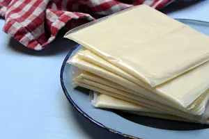 Processed Cheese Slices Prints: Processed cheese, processed cheese slices packed in plastic