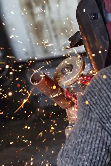 Factory Production Process Prints: Processing root weld with a cutting machine