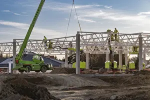 Industrial Construction Project Prints: Professional construction crew using a telescopic handler